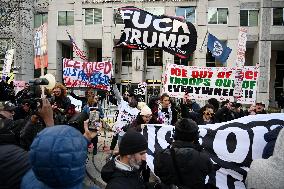 Anti-ICE protesters gather outside the US Immigration and Customs Enforcement (ICE)  headquarters