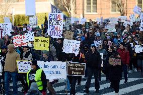 Anti-ICE protesters gather outside the US Immigration and Customs Enforcement (ICE)  headquarters