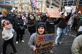 Anti-ICE protesters gather outside the US Immigration and Customs Enforcement (ICE)  headquarters