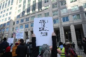 Anti-ICE protesters gather outside the US Immigration and Customs Enforcement (ICE)  headquarters