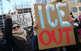 Anti-ICE protesters gather outside the US Immigration and Customs Enforcement (ICE)  headquarters