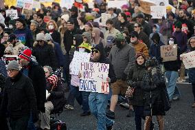Anti-ICE protesters gather outside the US Immigration and Customs Enforcement (ICE)  headquarters