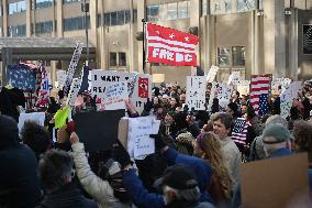Anti-ICE protesters gather outside the US Immigration and Customs Enforcement (ICE)  headquarters