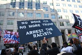Anti-ICE protesters gather outside the US Immigration and Customs Enforcement (ICE)  headquarters