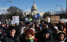 Anti-ICE protesters gather outside the US Immigration and Customs Enforcement (ICE)  headquarters