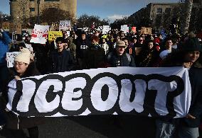 Anti-ICE protesters gather outside the US Immigration and Customs Enforcement (ICE)  headquarters