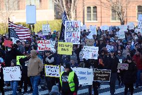 Anti-ICE protesters gather outside the US Immigration and Customs Enforcement (ICE)  headquarters