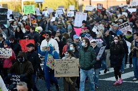 Anti-ICE protesters gather outside the US Immigration and Customs Enforcement (ICE)  headquarters