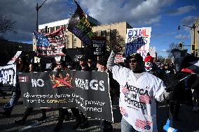 Anti-ICE protesters gather outside the US Immigration and Customs Enforcement (ICE)  headquarters