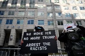 Anti-ICE protesters gather outside the US Immigration and Customs Enforcement (ICE)  headquarters