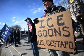 Anti-ICE protesters gather outside the US Immigration and Customs Enforcement (ICE)  headquarters