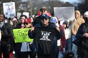 Anti-ICE protesters gather outside the US Immigration and Customs Enforcement (ICE)  headquarters