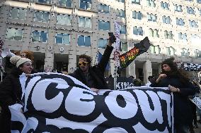 Anti-ICE protesters gather outside the US Immigration and Customs Enforcement (ICE)  headquarters