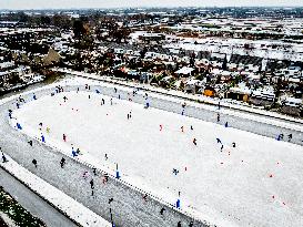 People Skate on Natural Ice Rink in Boskoop - Netherlands