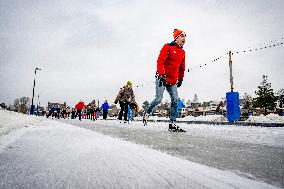 People Skate on Natural Ice Rink in Boskoop - Netherlands