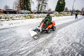 People Skate on Natural Ice Rink in Boskoop - Netherlands