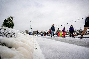 People Skate on Natural Ice Rink in Boskoop - Netherlands