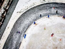 People Skate on Natural Ice Rink in Boskoop - Netherlands