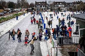 People Skate on Natural Ice Rink in Boskoop - Netherlands