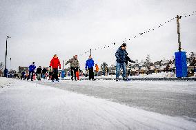 People Skate on Natural Ice Rink in Boskoop - Netherlands