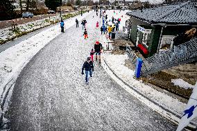 People Skate on Natural Ice Rink in Boskoop - Netherlands