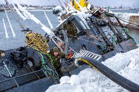 Rescue efforts for storm-sunk ship