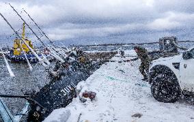 Rescue efforts for storm-sunk ship