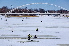 Fishermen at winter