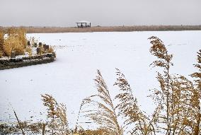 Snowfall Landscape at Aydingkol Lake