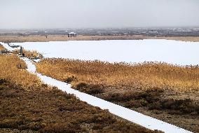 Snowfall Landscape at Aydingkol Lake
