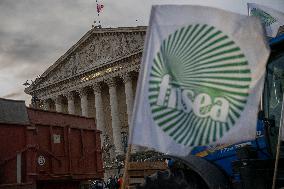Farmers Protest with Tractors in Front Of The National Assembly - Paris