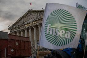 Farmers Protest with Tractors in Front Of The National Assembly - Paris