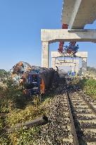 At Least 22 Dead as Crane Collapses onto Train - Thailand