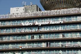 Nidek Kyoto Tower exterior, logo, and signboard