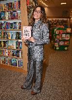 Sarah Shahi book signing