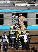 CORRECTED: Power outage stops train in Japan