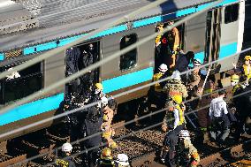 CORRECTED: Power outage stops train in Japan