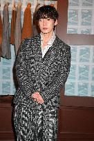 MFW - Celebs At Zegna Fashion Show