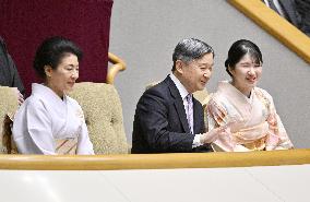 Emperor watches New Year sumo tournament