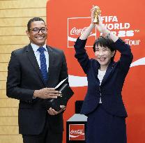 Japan PM Takaichi with FIFA trophy