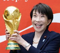 Japan PM Takaichi with FIFA trophy