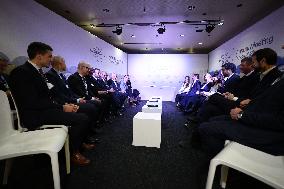 Macron and with leaders of AI companies at World Economic Forum annual meeting - Davos
