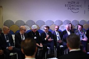 Macron and with leaders of AI companies at World Economic Forum annual meeting - Davos