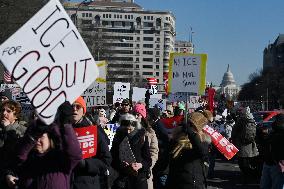 People protest on the first anniversary of President Donald Trump's second term in office