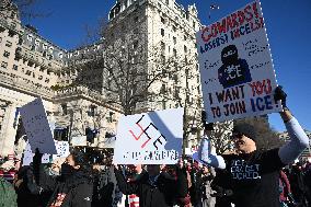 People protest on the first anniversary of President Donald Trump's second term in office