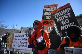 People protest on the first anniversary of President Donald Trump's second term in office