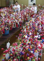 Making of lucky charms at western Japan shrine