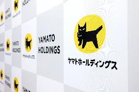 Yamato Holdings signboard and logo