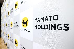 Yamato Holdings signboard and logo