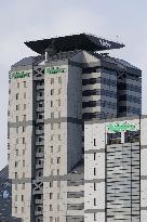 Nidek exterior, logo, and signboard